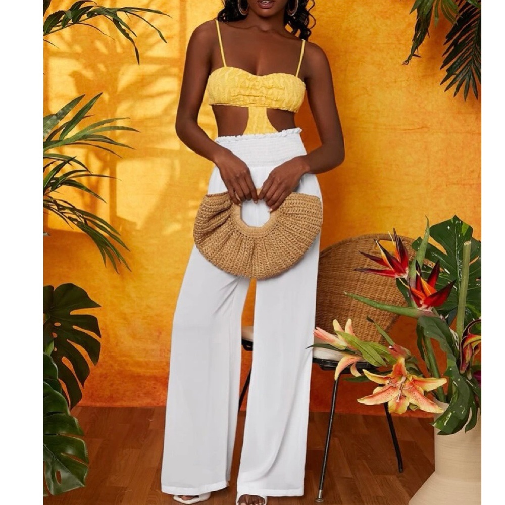 White wide legged pants, run a little big and are a bit long.